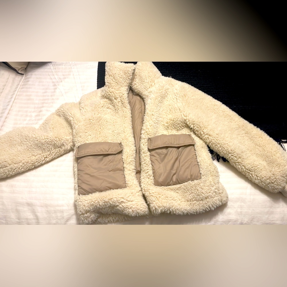 Zara.  Faux fur coat for girl